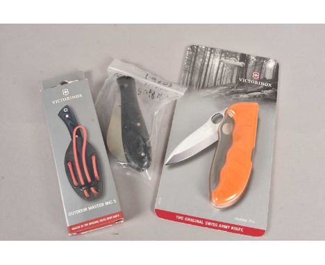 Victorinox - HunterPro knife, in orange, together with a Victorinox Outdoor Master MIC S, and another (3)