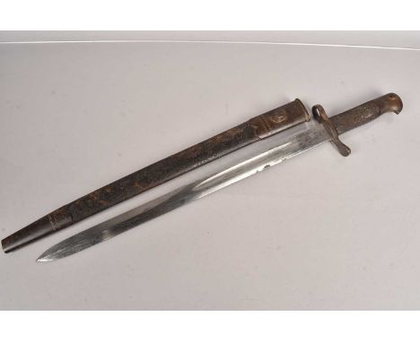 A British 1875 Volunteer Sawback, having 45.5cm long blade, with stamp of a King to one side, complete with steel and leather