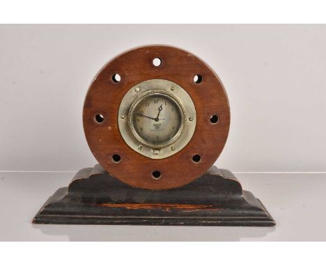 A Propeller Mantle Clock, the body unstamped, with Smiths clock to the centre, serial 65408, with rim winder