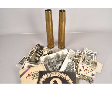 Two WWII 40mm shells, both dated 1943, together with two Cornwall Light Infantry cap badges, plus a good collection of Milita