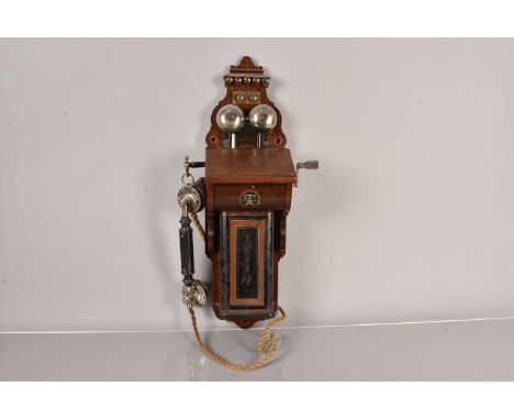 A pre 1900 Ericsson Wall Telephone, c.1895, possibly Model 355, having writing slope with label to interior and serial number