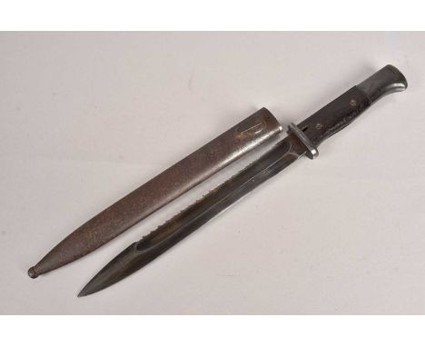 A WWI S84/98 Sawback bayonet, with makers name to the blade, dated 1916 to the spine, complete with scabbard (2)