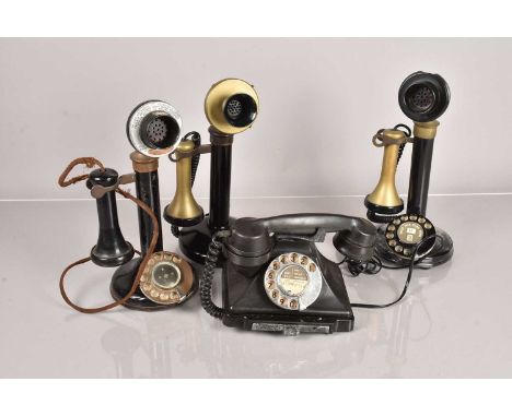 Three vintage Stick Telephones, one without dial, one been converted to modern lines, and another, together with another tele