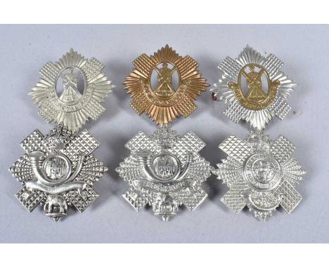 Scottish, an assortment of badges, to include three Highland Light Infantry and three Royal Scots, one possibly plated (untes