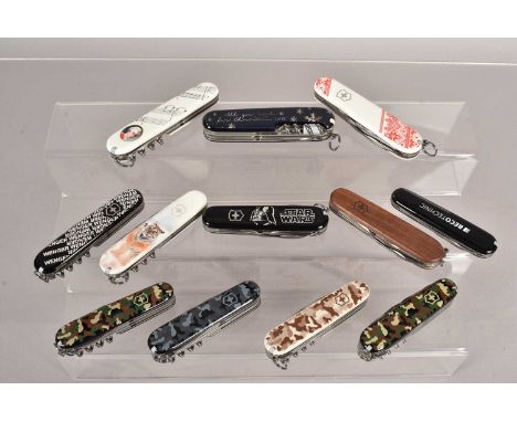 Victorinox - a selection of various knives, comprising four Climber Camouflage, a Spartan Star Wars, Spartan Wood, a Christma