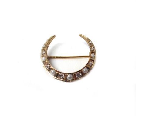 A 9ct gold, cultured pearl and diamond brooch, designed as a crescent, mounted with alternating cultured pearls and circular 
