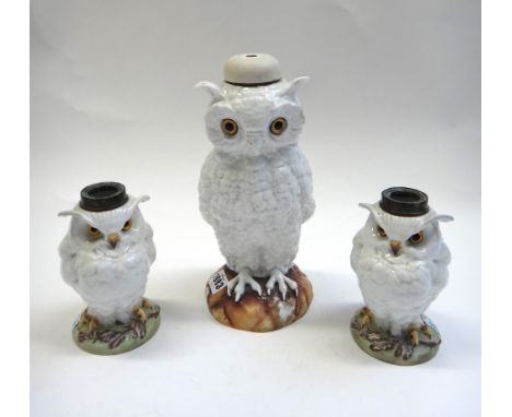 A Continental porcelain 'Owl' table lamp, circa. 1900, modelled atop a naturalistic circular base (27cm high) and a smaller s