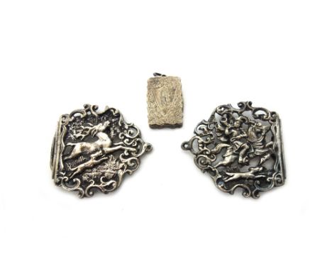 A late Victorian silver shaped rectangular vinaigrette, with a scroll pierced and gilt grille, the exterior with foliate engr