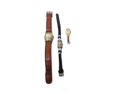 A 9ct gold waisted rectangular cased gentleman's wristwatch, with an unsigned Swiss jewelled lever movement, the silvered dia