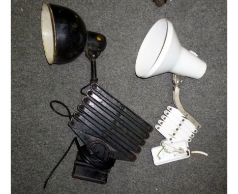 After Christian Dell; a work bench lamp, with circular shade above concertina action frame, unmarked, 44cm high; a similar la