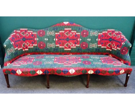 A George II style sofa with serpentine crest over triple bow seat on tapering square supports, 196cm wide x 88cm high. 