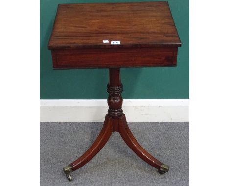 An early Victorian mahogany writing table, the angle adjustment top over fitted drawer and tripod base, 48cm wide x 75cm high