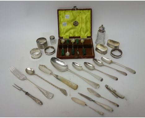 Silver and silver mounted wares, comprising; six napkin rings, a bottom marked tablespoon, London probably 1757, four teaspoo