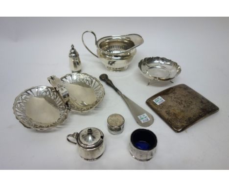 Silver and silver mounted wares, comprising; a milk jug, Sheffield 1932, a twin handled bonbon dish, with a carrying handle, 