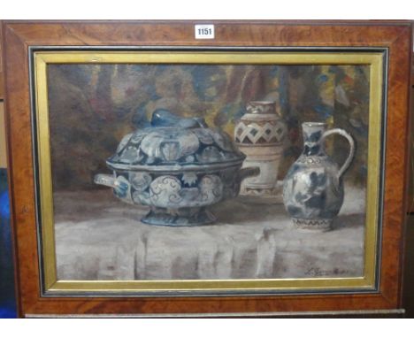 Leon Garraud (1877-1961), Still life of Delftware, oil on board, with a portrait verso, signed and dated '31, 38cm x 55cm.; t