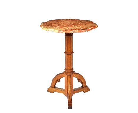 A 19th century occasional table, the later shaped marble top on a Gothic Revival carved oak tripod base, 56cm wide x 76cm hig