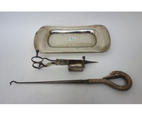 A Victorian silver handled steel button hook, the handle formed as a swan's head, London 1888, a pair of plated candle snuffe