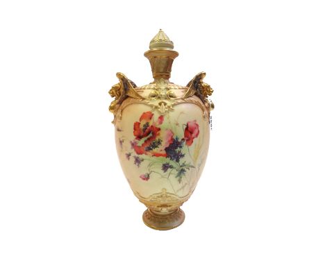 A Royal Worcester blush ivory vase and cover, circa 1900, with twin gilt anthropomorphic mask handles against an ovoid body, 