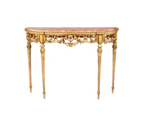 A Louis XVI style painted console table, the D shaped marble top over a pierced and carved polychrome painted floral frieze o