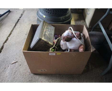 A box of various items to include table lamp; child's soft toys; a quantity of various light bulbs; metal embossed tin etc.
