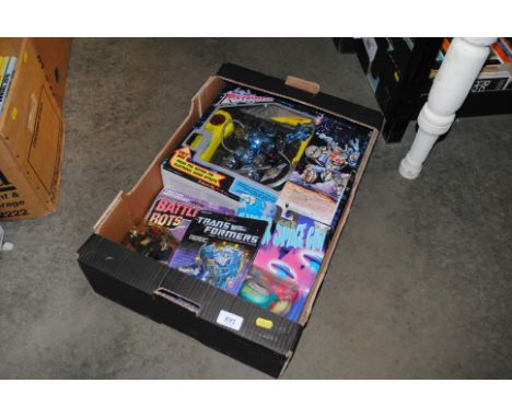 A box of vintage and other toy robots