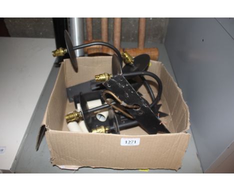 A box containing a quantity of wall hanging single branch light fittings