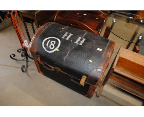 A canvas and leather bound dome top trunk AF