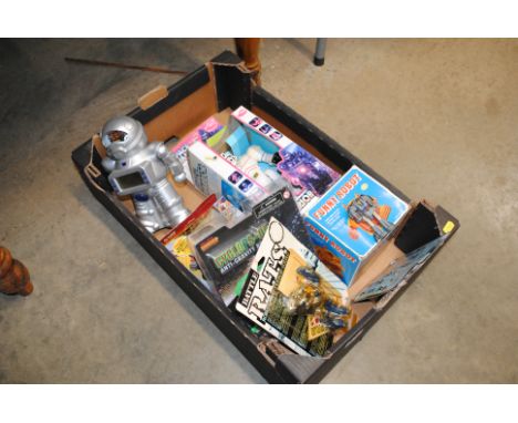 A box of vintage and other toy robots