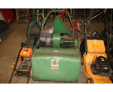 A Ransoms 24" petrol ride-on lawnmower with split drum rear roller