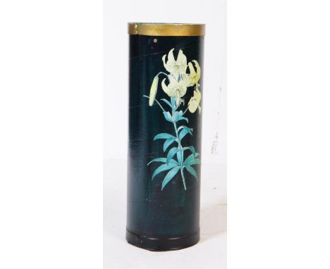 A vintage 20th century toleware style umbrella stick stand. The stand being painted green with transfer lily decoration.&nbsp