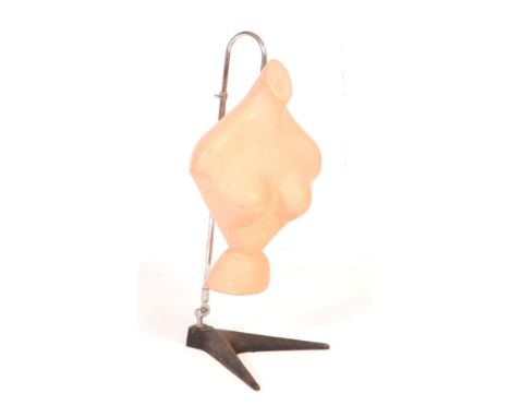 A vintage mid 20th century circa 1950s hanging mannequin. The mannequin hung on a metal frame, with adjustable height arm and