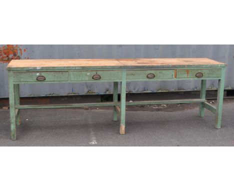 A large vintage 20th century engineering factory woodwork table. Of rectangular form with of painted pine construction. Havin