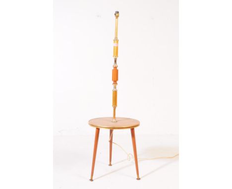 Mid-century standard lamp in teak with terraced table centre and shade above. Measures approx. 120x20x28cm
