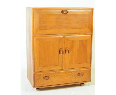 Lucian Ercolani - Ercol - Windsor Model 469 - Serving Cabinet - A 1960s retro beech wood cocktail / bureau cabinet having a d