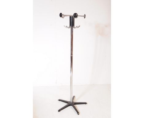 A retro 20th century Space Age free standing coat and hat stand. Upright form with a series of protruding disc hook tops with