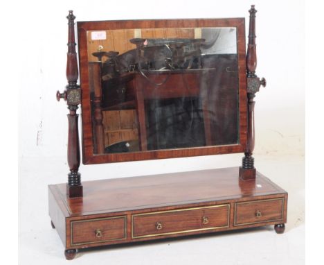 A George III 19th Century brass band inlaid mahogany veneered toilet swing mirror. with axe head finial handles The mirror sq