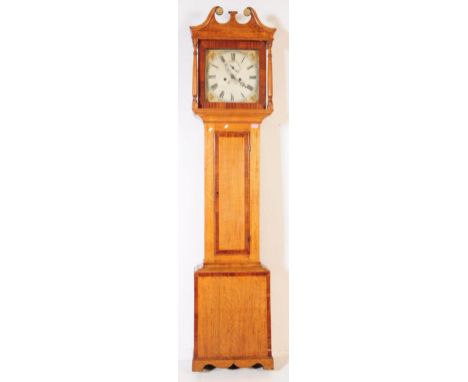 A George III 19th Century walnut painted face 8 day movement longcase clock having date and seconds apertures. The painted di