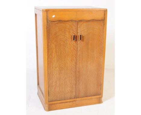 A vintage 20th century circa 1940s Art Deco cabinet / cupboard. Rectangular form with twin full length cupboard doors. With s