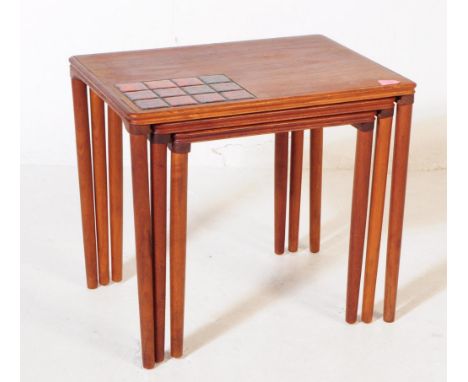 Danish Modern Design - A retro mid 20th century tile top teak nest of graduating tables. Of rectangular form with a quarter t