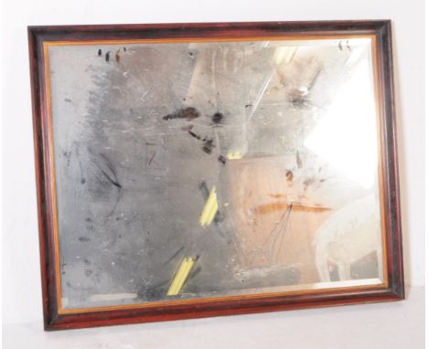 A vintage 20th century wall hanging over mantel mirror. Of rectangular form with painted / brush frame with central mirrored 