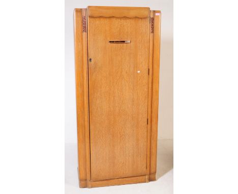 A vintage 20th century walnut Art Deco single wardrobe / closet. Of rectangular form with single front full length wardrobe w