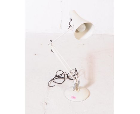 Herbert Terry - A mid 20th century anglepoise industrial desk top lamp light. Having a conical shade with metal arm on a circ