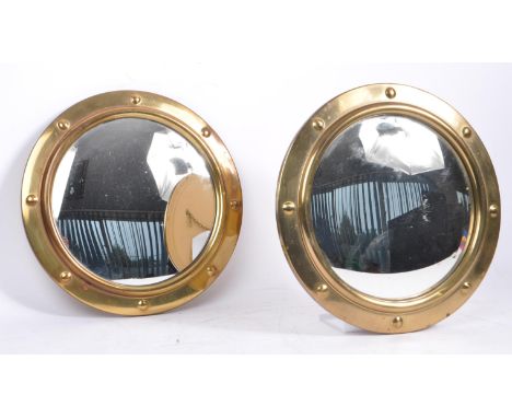 Two vintage mid Century 1940s metal regency revival gilt framed convex mirrors. Measuring approximately 30cm diameter.&nbsp;