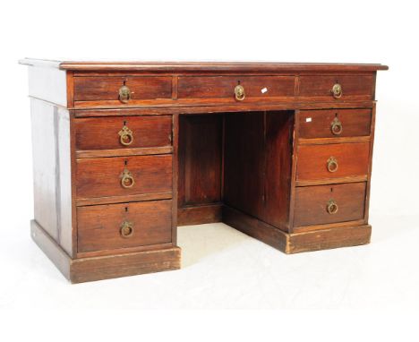 A 19th century mahogany twin pedestal office writing table. Of rectangular form with parquetry inlaid top. Knee hole to centr