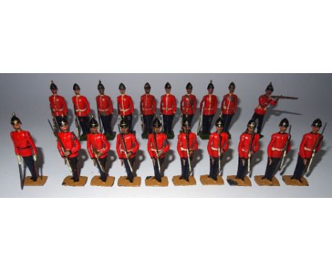 Britains from set 113, East Yorkshire Regiment at attention (Condition Fair, six helmet spikes missing, one rifle damaged, tw