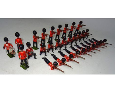 Britains set 90, Coldstream Guards firing with Officer, kneeling Officer, Drummer and Bugler (Condition Very Good-Good, tip o