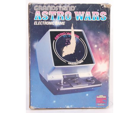 An original 1980's Grandstand Astro Wars battery powered games console. Within its original box.&nbsp;