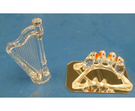 A Swarovski four song birds on a branch and harp with base