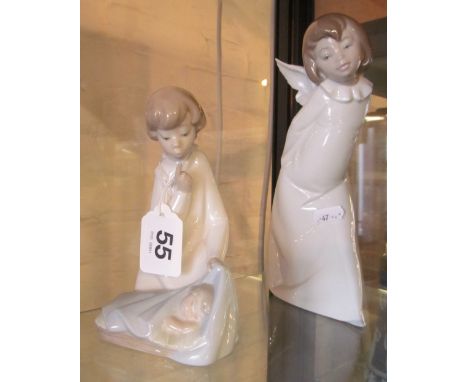 Two Lladro figures angels one with lantern behind back and the other with sleeping child