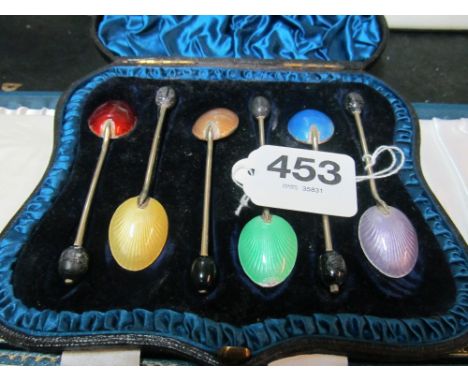 A set of six bean terminal and enamel coffee spoons (s/a/f) boxed